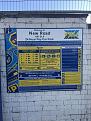 Excell Parking sign on wall next to the ticket machine